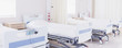 Hospital beds in empty room