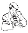 Businessman watches the time on his wrist watch