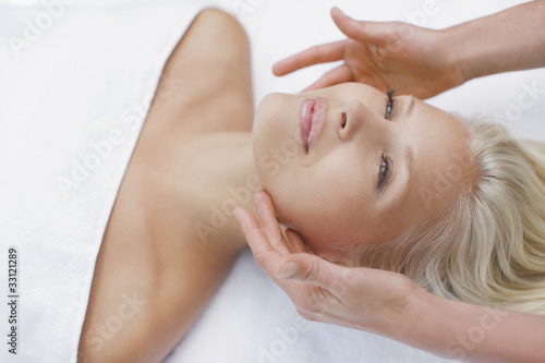 Foto: Woman enjoying facial Woman enjoying facial