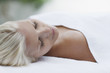 Close up of woman laying on massage table