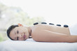 Woman enjoying lastone therapy Woman enjoying lastone therapy