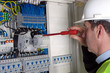 Photo: Electrician during measurment Electrician during measurment