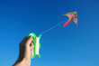Hand keeps kite in the sky Hand keeps kite in the sky