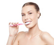 woman brushing her teeth