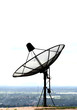 Satellite dish in front of the city