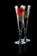 Two glasses of sparkling wine (champagne) and strawberry