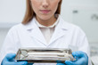 Dentist holding tray with dental tools