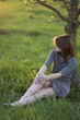 Young woman sitting under the tree Young woman sitting under the tree