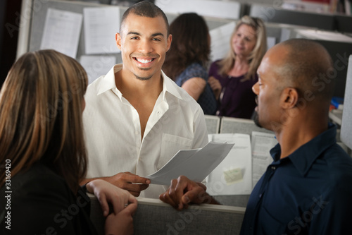 Photo: Happy Office Worker With Coworkers Happy Office Worker With Coworkers