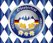 Bavarian Oktoberfest with beer mugs and German flag