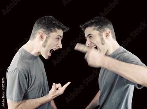 Photo: Man fighting with himself Man fighting with himself