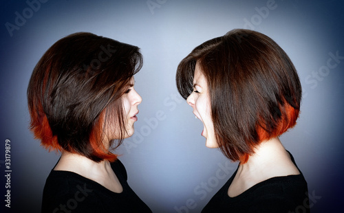 Photo: Woman yelling at herself Woman yelling at herself