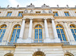 Details of Castle Versaille with blue sky in the background