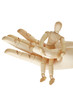 wooden hand holding wooden mannequin isolated on white wooden hand holding wooden mannequin isolated on white