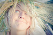 Image of young woman on wheat field