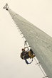 Photo: Climber resting in the middle of the climb Climber resting in the middle of the climb
