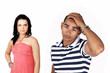 Sad angry couple, with woman in background focus