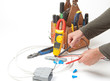 Electrician testing wire meter