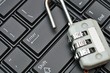 Photo: Padlock on black keyboard Padlock on black keyboard