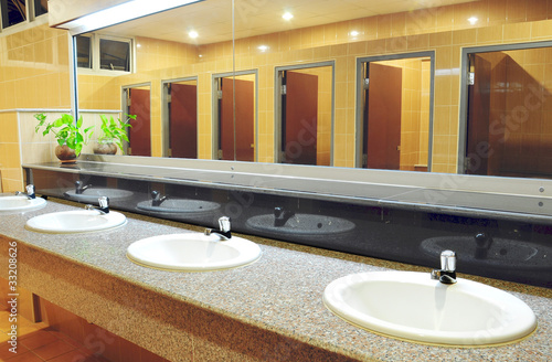 Photo: Handbasin and mirror in toilet Handbasin and mirror in toilet