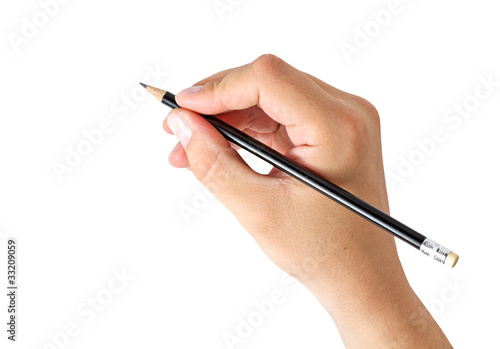 Photo: hand holding a pencil hand holding a pencil