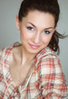 Closeup portrait of a beautiful young lady smiling