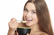 Photo: woman eating cereals woman eating cereals