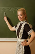 Happy school girl on math classes finding solution Happy school girl on math classes finding solution
