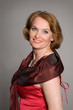 Smiling woman in red dress
