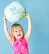 A little girl with a globe