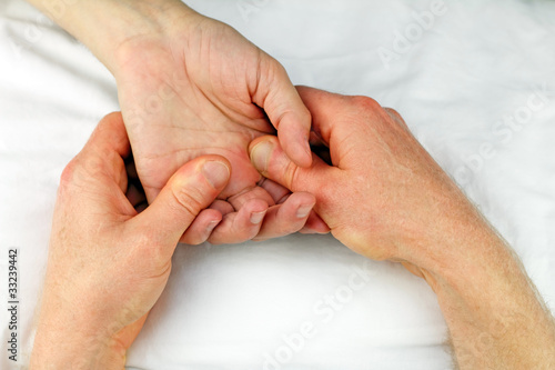 Photo: Massaging a Palm Massaging a Palm