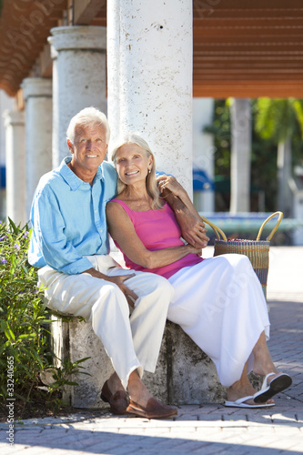Photo: Happy Senior Couple Smiling Outside in Sunshine Happy Senior Couple Smiling Outside in Sunshine