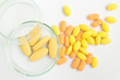yellow pills on white background