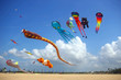 Colourful kites on the beach
