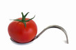 ����: Red tomato on a serving spoon � 18042011 #33243044