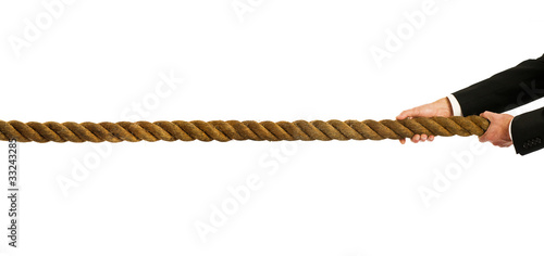 Photo: pulling thick rope pulling thick rope