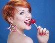 Playful girl with lollipop
