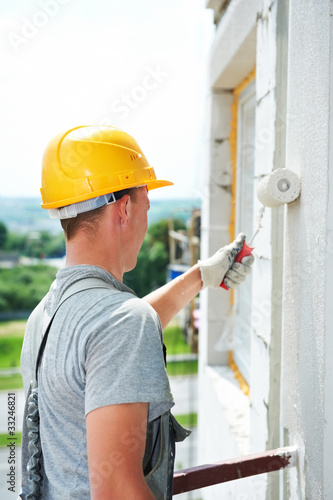 Photo: builder facade painter worker builder facade painter worker