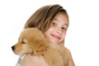 child holding puppy