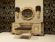 Baroque table with mirror on the wallpaper background Baroque table with mirror on the wallpaper background
