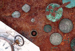 Watches and coins closeup Watches and coins closeup