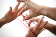 Hand und roter Faden Hand und roter Faden
