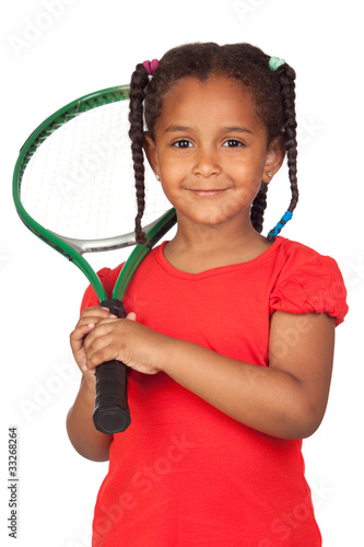 Photo: African little girl with a tennis racket African little girl with a tennis racket