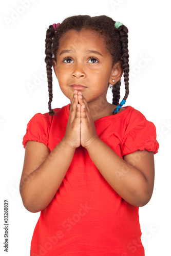 Photo: Sad little girl praying for something Sad little girl praying for something