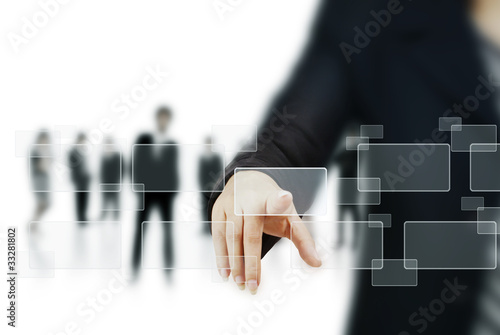 Photo: hand pushing on a touch screen interface hand pushing on a touch screen interface