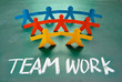 Teamwork words and colorful paper dolls Teamwork words and colorful paper dolls
