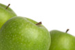 a group of juicy green apples