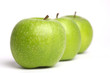 a row of fresh green apples
