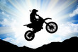 Moto racer in sunny sky.