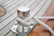 Ship Knotted Onto Pier With White Rope
